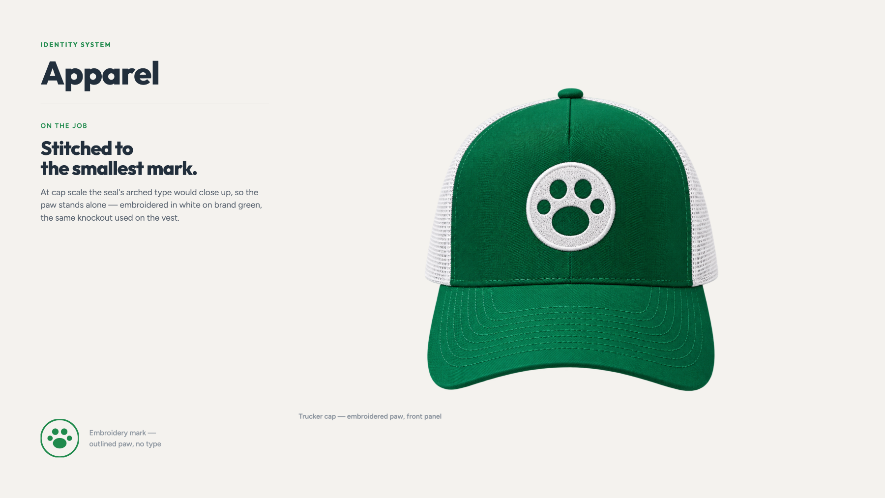 Ground Patrol trucker cap — embroidered paw on the front panel